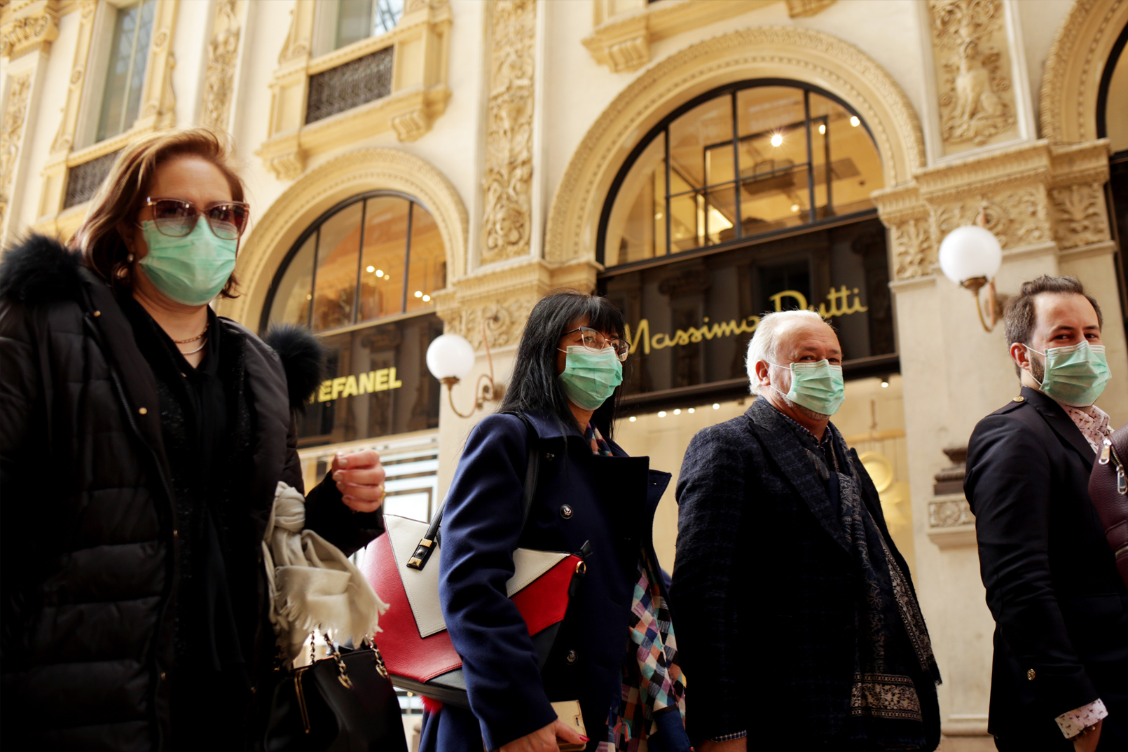 Shoppers wearing masks